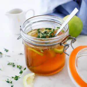 jar of thyme infused honey for a homemade cough syrup